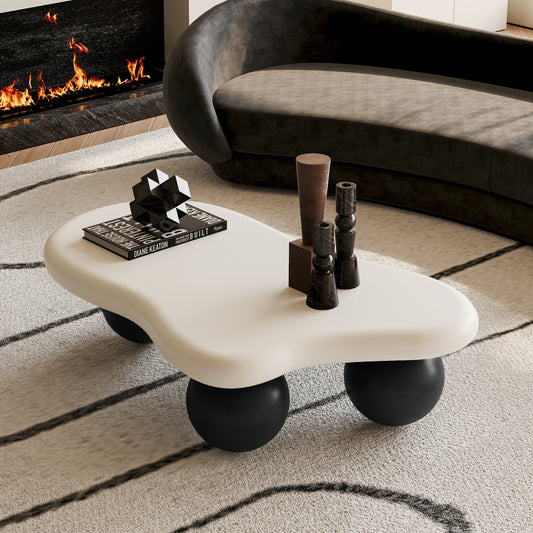 Molly 40 Inch Cloud Shaped Coffee Table, White Top Black Legs